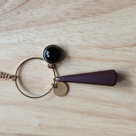 Necklace with a black charm and a purple cone-shaped rubber charm - Picture 2 of 4
